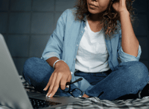 woman searching how to find a rehab center to help her loved one overcome addiction and substance abuse